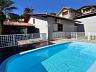 Casa plana na divisa com o Sagua�u | Piscina, energia solar e 4 vagas 30