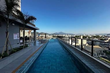 Apartamento a venda na Avenida Brasil, sentido norte de Balneário Camboriú, com 143m², 3 suítes e 3 vagas de garagem.