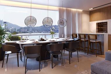 Apartamento em construção na quadra do mar, em Balneário Camboriú, com 3 suítes, 139 m² privativos e 2 vagas de garagem. Entrega prevista para 2026.